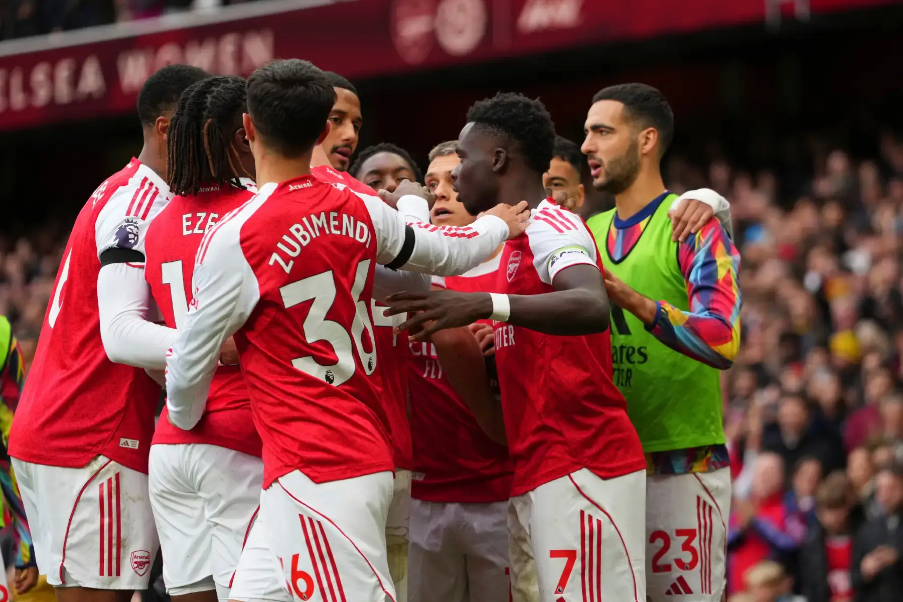 Arsenal players celebrate a goal