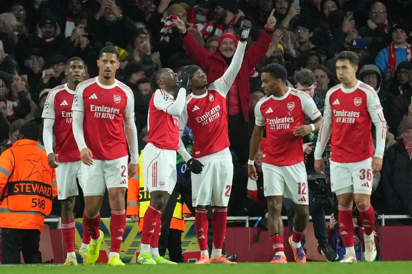 Arsenal players celebrate a goal