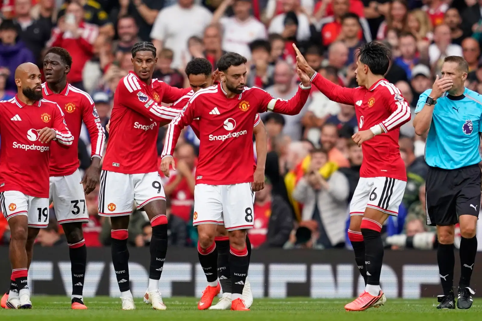 Manchester United's Bruno Fernades Celebrates with Team